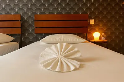 Un ou plusieurs lits dans un hébergement de l'établissement Le chic Calme - Central - Cosy