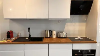 Cuisine ou kitchenette dans l'établissement Le chic Calme - Central - Cosy