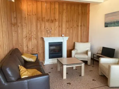 Coin salon dans l'établissement Apartment in Cuzy with Heated Pool