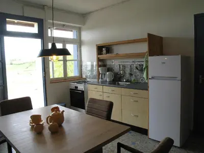 Cuisine ou kitchenette dans l'établissement Apartment in Cuzy with Heated Pool