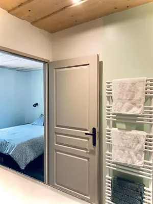 Un ou plusieurs lits dans un hébergement de l'établissement Magnifique maison de village