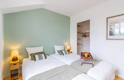 Un ou plusieurs lits dans un hébergement de l'établissement Jardin suspendu - 3 chambres - 2 salles de bain - Parking dans résidence privée