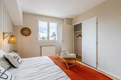 Un ou plusieurs lits dans un hébergement de l'établissement Jardin suspendu - 3 chambres - 2 salles de bain - Parking dans résidence privée