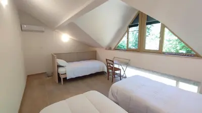 Un ou plusieurs lits dans un hébergement de l'établissement Gite de la voie verte, à Ameugny - Taizé