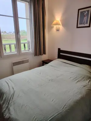 Un ou plusieurs lits dans un hébergement de l'établissement Apartment in Beaune