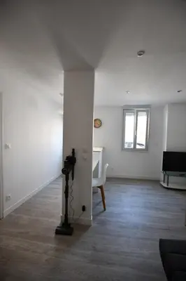 Télévision ou salle de divertissement dans l'établissement Le Petit Cocon