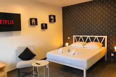 Un ou plusieurs lits dans un hébergement de l'établissement L Évasion Cosy Central Cosy