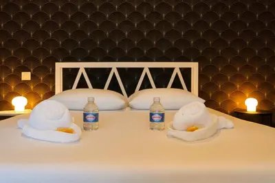 Un ou plusieurs lits dans un hébergement de l'établissement L Évasion Cosy Central Cosy