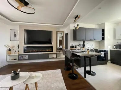 Cuisine ou kitchenette dans l'établissement Appartement Premium - Le Trente