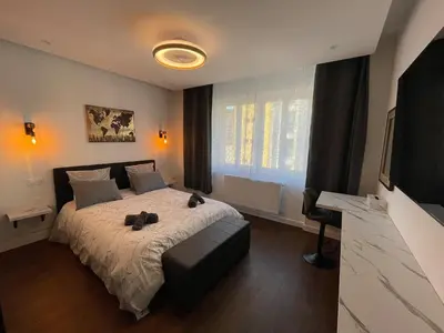 Un ou plusieurs lits dans un hébergement de l'établissement Appartement Premium - Le Trente
