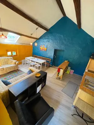 Coin salon dans l'établissement La Maison du bonheur - Gîte PIPA - Corancy