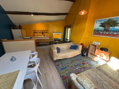 Coin salon dans l'établissement La Maison du bonheur - Gîte PIPA - Corancy