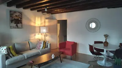 Coin salon dans l'établissement Appartement dans le centre historique