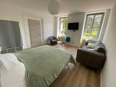 Télévision ou salle de divertissement dans l'établissement Appartement proche centre ville