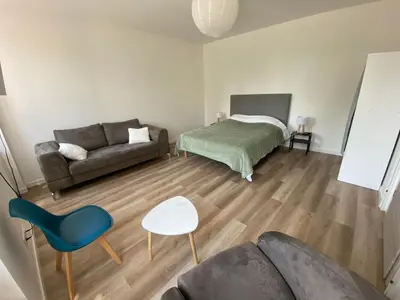Un ou plusieurs lits dans un hébergement de l'établissement Appartement proche centre ville