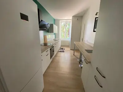 Cuisine ou kitchenette dans l'établissement Appartement proche centre ville