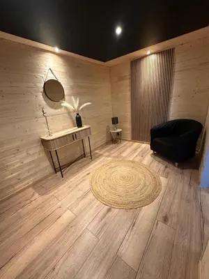 Coin salon dans l'établissement Le MANI