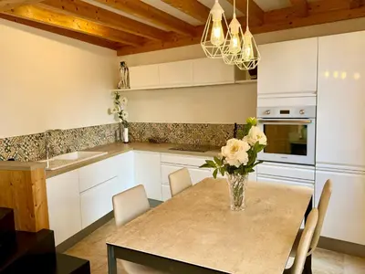 Cuisine ou kitchenette dans l'établissement Maisonnette au cœur des vignes