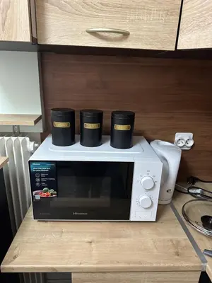 Cuisine ou kitchenette dans l'établissement Studio