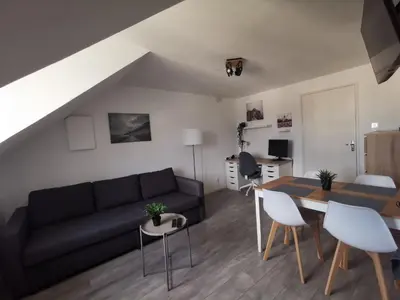 Coin salon dans l'établissement LE SAINT LOUIS Dijon