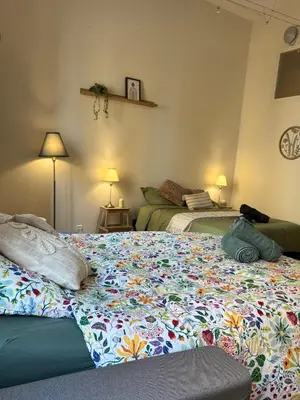 Un ou plusieurs lits dans un hébergement de l'établissement Appartement 6 personnes Paray-le-monial