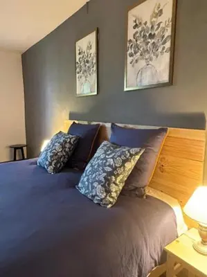 Un ou plusieurs lits dans un hébergement de l'établissement Les Chambres du 11 - Chambres et Table d'hôtes