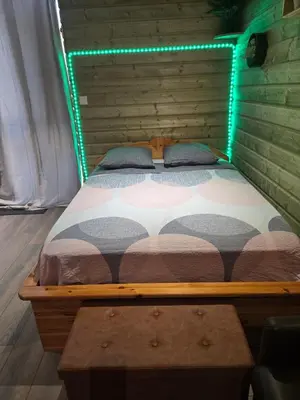 Un ou plusieurs lits dans un hébergement de l'établissement Le chalet de vénus