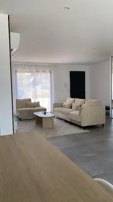 Coin salon dans l'établissement Jolie maison, plain-pied à Dole
