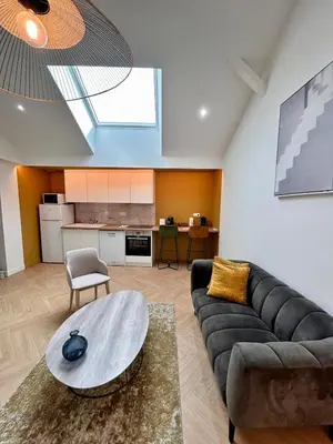 Cuisine ou kitchenette dans l'établissement Le Loft