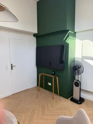 Télévision ou salle de divertissement dans l'établissement Le Loft