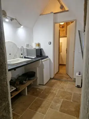 Cuisine ou kitchenette dans l'établissement Le pigeonnier du meix guillot