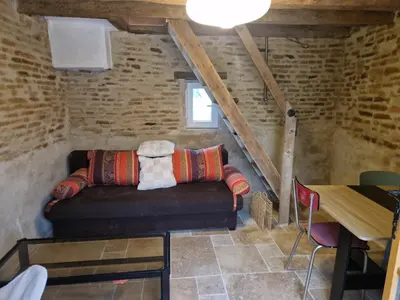 Coin salon dans l'établissement Le pigeonnier du meix guillot