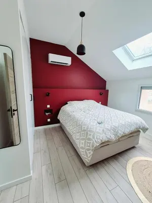 Un ou plusieurs lits dans un hébergement de l'établissement Appartement Spa et Terrasse