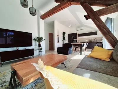 Télévision ou salle de divertissement dans l'établissement Appartement Spa et Terrasse