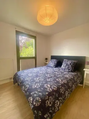 Un ou plusieurs lits dans un hébergement de l'établissement Appartement résidence piscine - Dijon quartier Toison d'Or