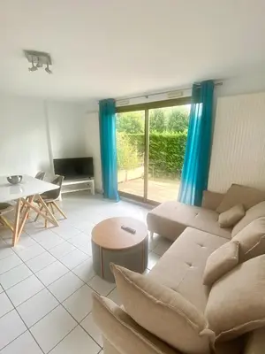 Coin salon dans l'établissement Appartement résidence piscine - Dijon quartier Toison d'Or