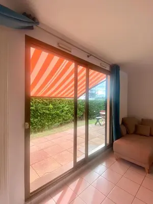 Coin salon dans l'établissement Appartement résidence piscine - Dijon quartier Toison d'Or