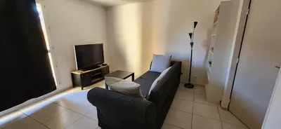 Télévision ou salle de divertissement dans l'établissement Appartement Duplex