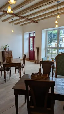 Coin salon dans l'établissement Auberge de la Belette Cendrée