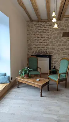 Coin salon dans l'établissement Auberge de la Belette Cendrée