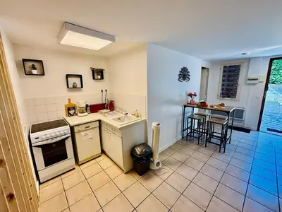 Cuisine ou kitchenette dans l'établissement Le cosy - T2 52m2 - Proche Gare TGV et RCEA