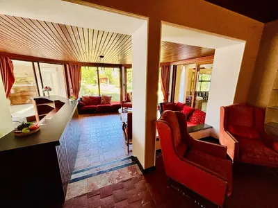 Coin salon dans l'établissement Maison de maître - 15 personnes - Proche Le Creusot