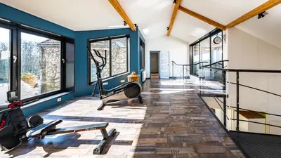 Salle ou équipements de sports de l'établissement Maison ALMA Piscine -Baby Foot - Cheminée- Jacuzzi