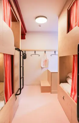 Un ou plusieurs lits dans un hébergement de l'établissement Mustard Hostel