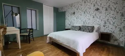 Un ou plusieurs lits dans un hébergement de l'établissement appartement plein centre ville