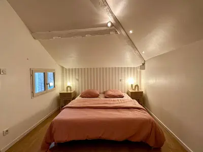 Un ou plusieurs lits dans un hébergement de l'établissement Maison cosy à côté de Beaune