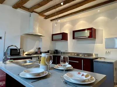 Cuisine ou kitchenette dans l'établissement Maison cosy à côté de Beaune