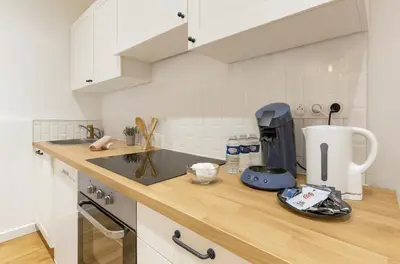 Cuisine ou kitchenette dans l'établissement La parenthèse mâconnaise d Excellence Conciergerie