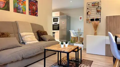 Coin salon dans l'établissement Le Cosy - Place du 30 octobre - 4 personnes