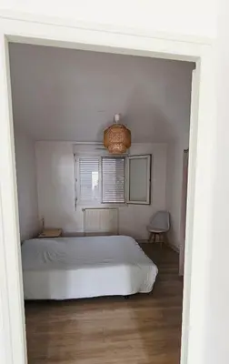 Un ou plusieurs lits dans un hébergement de l'établissement Cozy house in downtown Dole